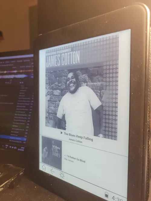 Close-up of the discovery display showing the artist and track title